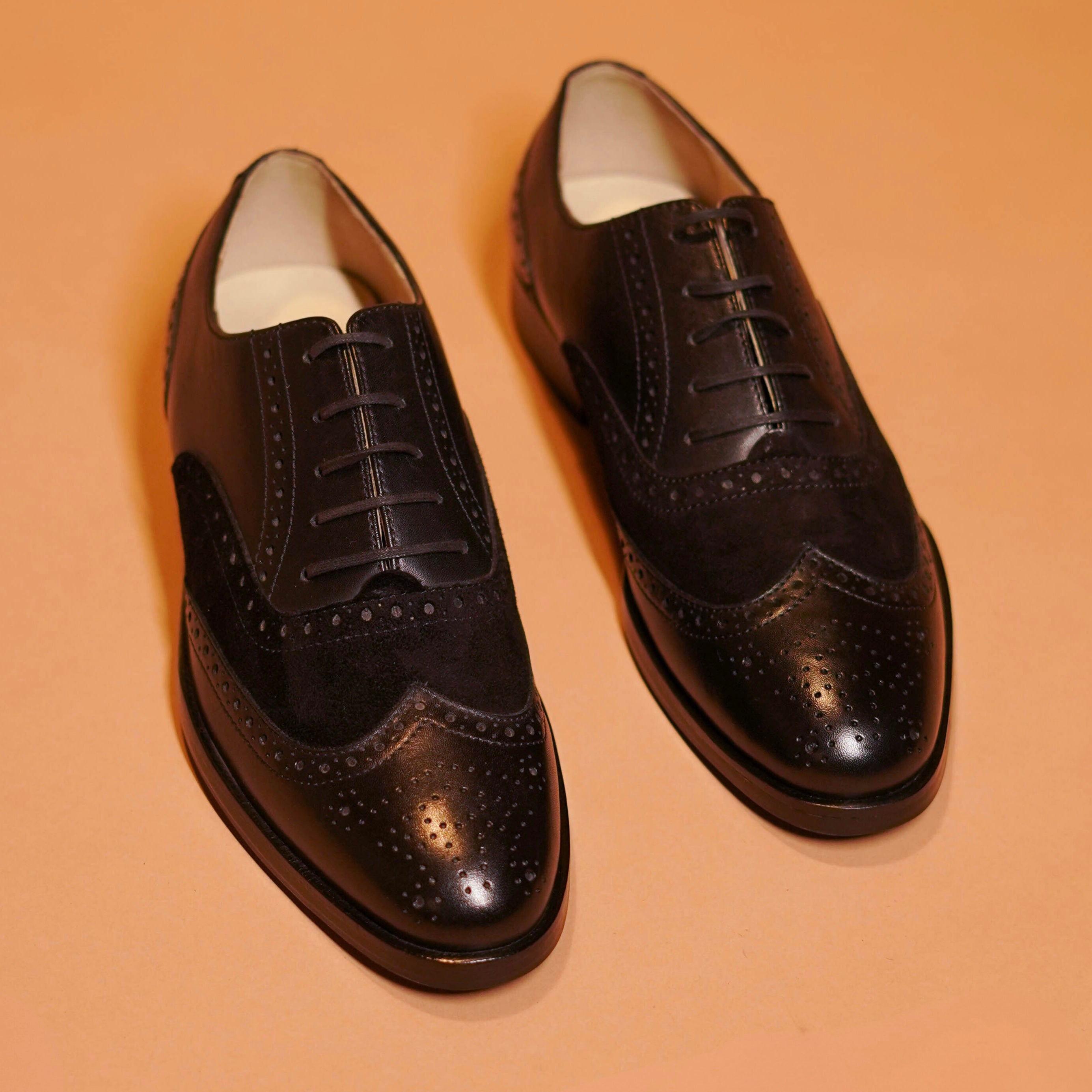 Caro Carbonio | Suede and Patent leather black brogues
